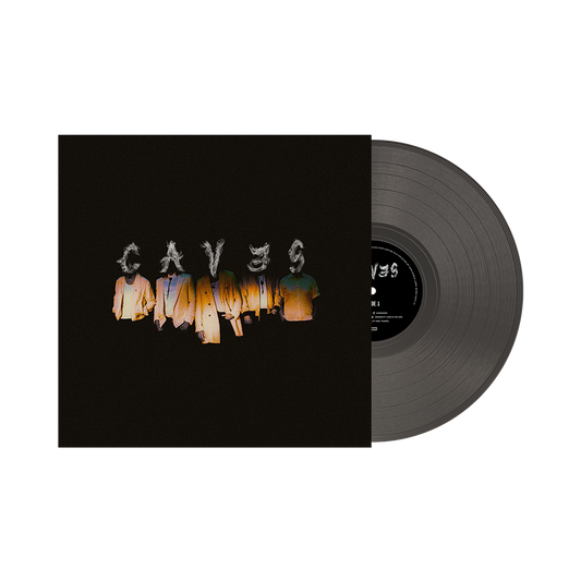 A vinyl record labeled 'CAVES' with a black background and three individuals standing close together in a dark hue.