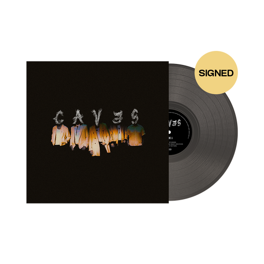 Signed vinyl record of NEEDTOBREATHE's album 'CAVES' with smoke color vinyl disc and a black cover featuring the band's name in stylized text.