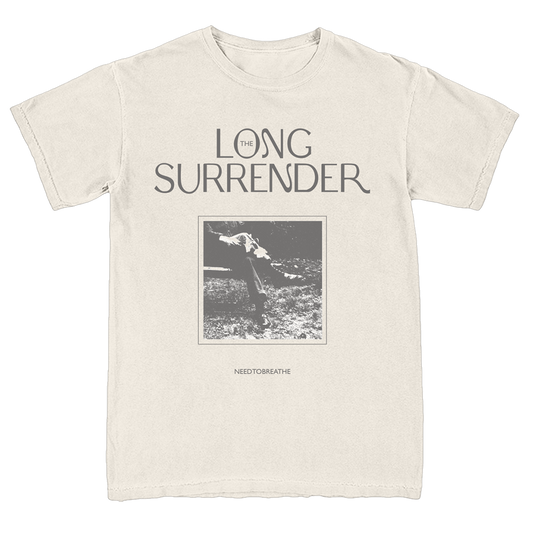 Beige t-shirt with 'The Long Surrender' graphic design on a white background