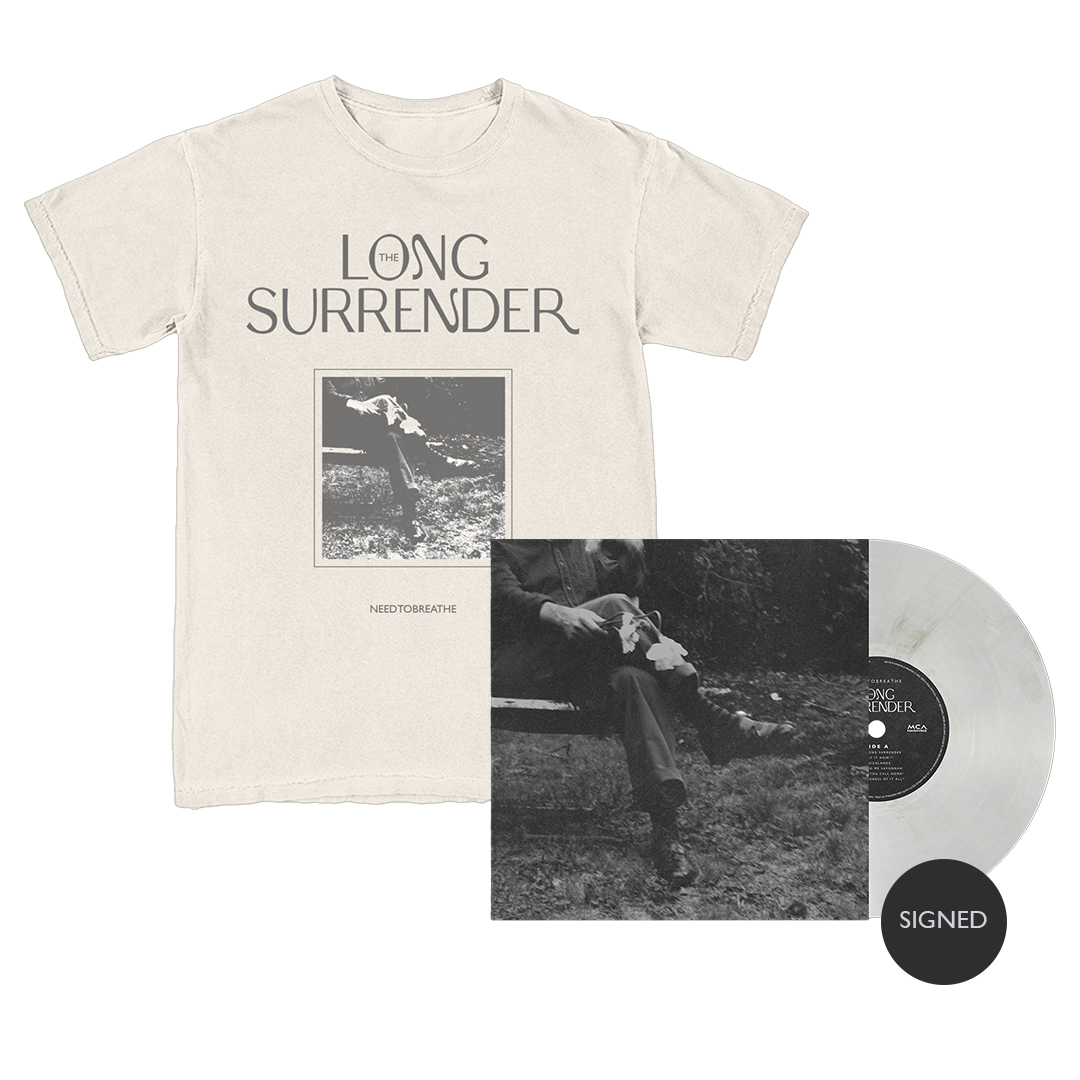 Beige t-shirt with 'The Long Surrender' design, vinyl record, and photo album on a white background
