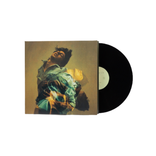 A standard black vinyl record with a cover featuring an image of a person.